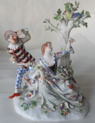 An Antique Meissen Figure Group Of Harlequin And A Lady. photo