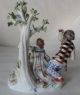 An Antique Meissen Figure Group Of Harlequin And A Lady. Figurines photo 1