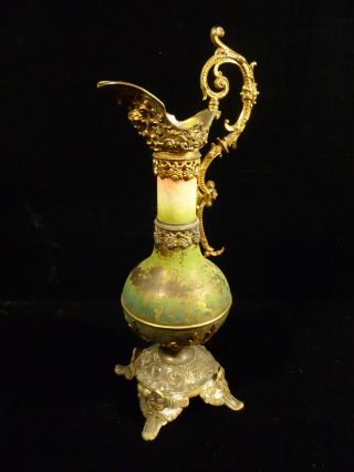 19th Century Polychrome Brass Ormolu Decorative Ewer With Cherub Face photo
