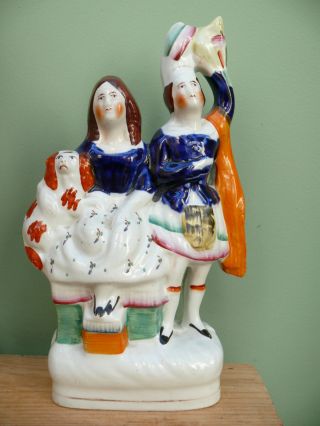 19thc Staffordshire Group Figure With Dog photo