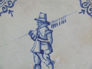 A Dutch Delft Tile With The Trade Of A Rat - Catcher +++++++++ photo