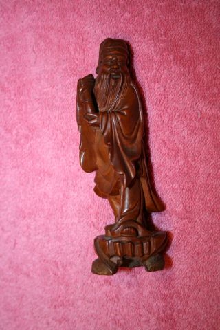 Antique Artistically Carved Holy Man photo