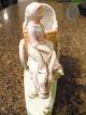 Porcelain Girl On A Buro Figurines photo 1