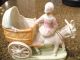 Porcelain Girl On A Buro Figurines photo 2