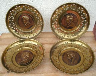 Set Of Four English Brass Composer Hanging Plates photo