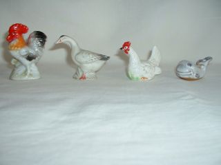 Assorted China Salts. . . . . .  Rooster,  Hen,  Whale photo