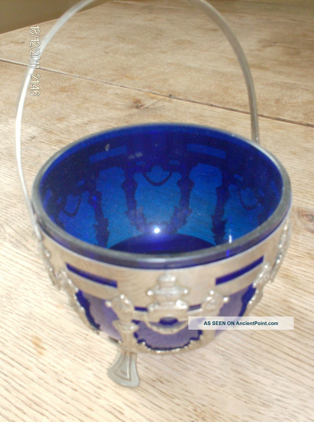 Sweet Little Bowl With Blue Glass And Silver Bowls photo