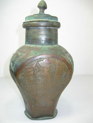 An Antique/vintage Copper/brass Hand Hammered Islamic ? Decorated Jar With A Lid photo