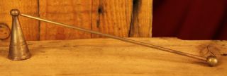 Brass Candle Snuffer With A Long Handle photo