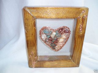 Copper Heart Filled With Rocks In A Wood Stain Frame photo