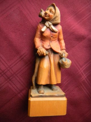 Black Forest Wood Carving Begger Woman With Cat On Shoulder & Cane photo