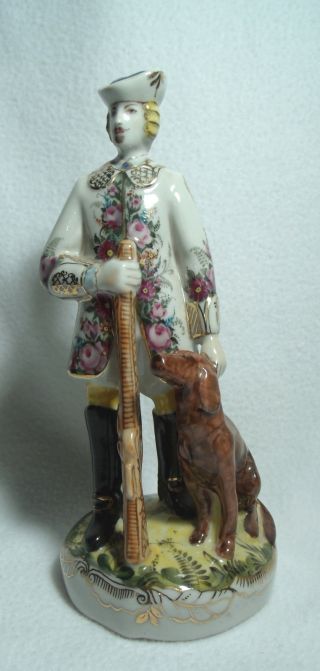 Vintage Russian Figurine Of A Hunter And Dog photo