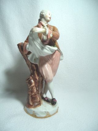 Antique German Figurine Of A Man Holding 2 Birds In Apron photo
