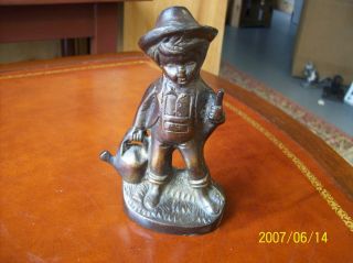 Vintage Heavy Metal Farmer Boy,  Very Collectible,  Unmarked,  Brass? Figurine, photo