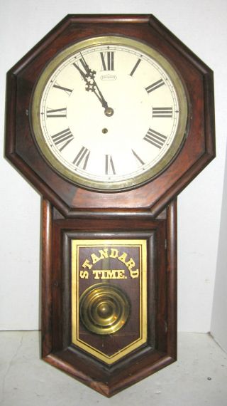 Ingraham Rosewood Wall Clock - Reflector 2 photo