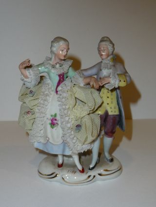 Vintage Dresden Porcelain Figurine photo