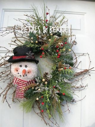 Christmas Holiday Winter Snowman Door Wreath Arrangement photo