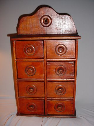 Antique Wood Wall Spice Cabinet Eight Drawers photo