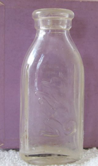 (-) (-) Wonderful Vintage Glass Baby Doll Bottle With Embossed Kangaroo photo
