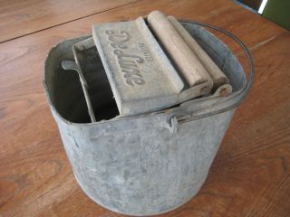 Vintage Deluxe Brand Galvanized Mop Bucket With Handle And Wood Rollers photo