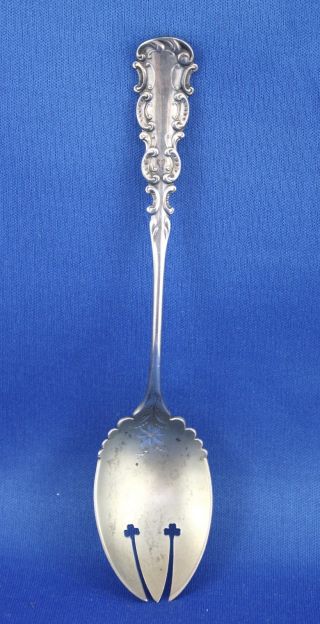 Detailed Antique Sterling Silver Condiment Fork In photo