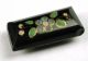 Antique Black Glass Button Bar With Colorful Enamel Floral Overlay Buttons photo 1