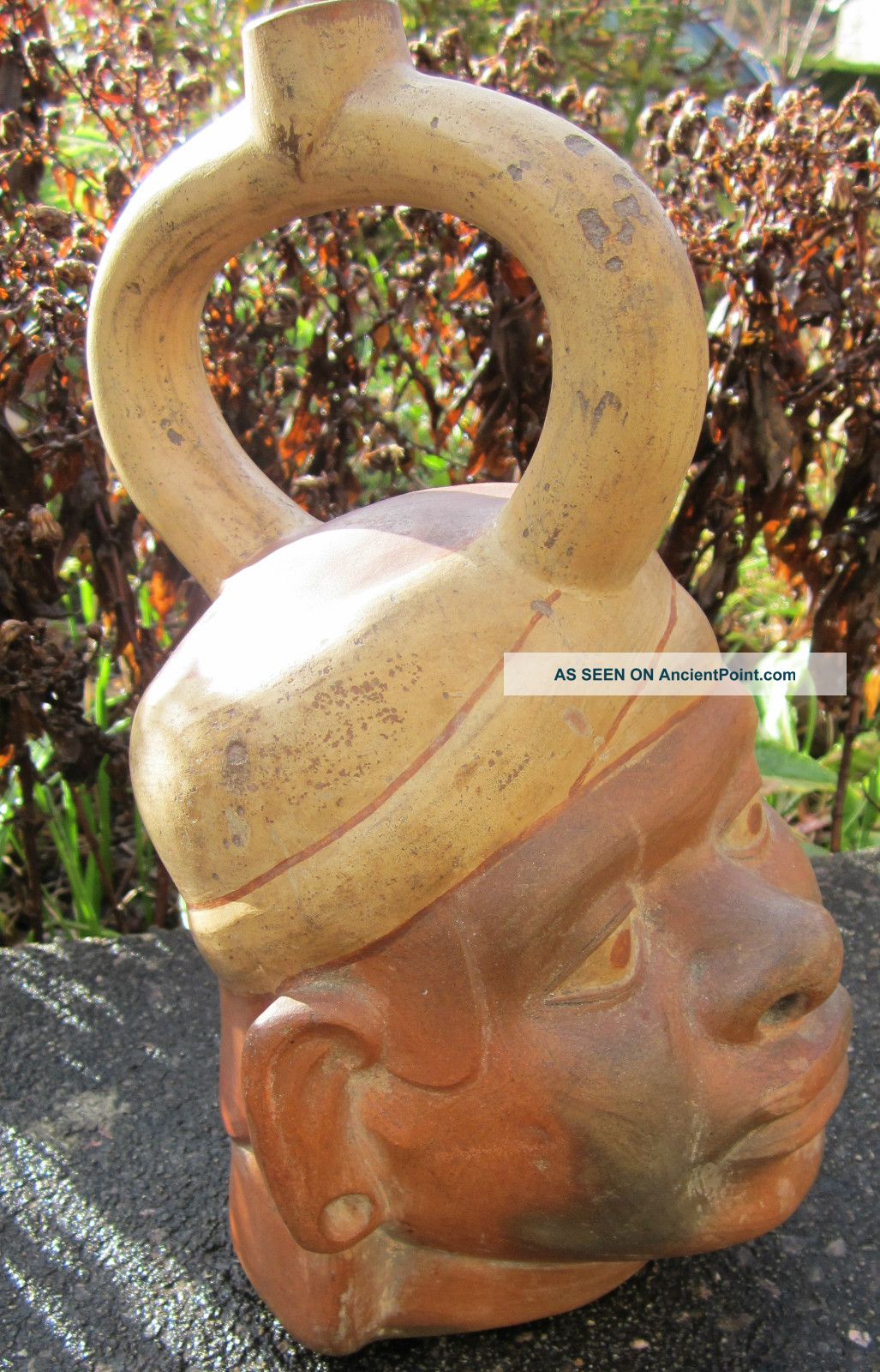 Moche Portrait Vessel.  Stirrup - Spout.  Peruvian Ceramics.  Terracotta.  Precolumbian. The Americas photo