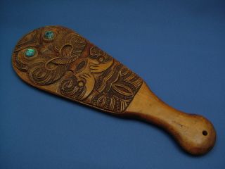 A Fine Antique Hand Carved Maori Patu. photo