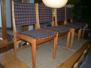 Midcentury Danish Modern Set Of Four Teakwood Dining Chairs photo