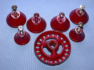 Seven Red Enameled Metal Knobs: 2 - Small & 4 Large Pull Plus 1 Garden Turn Knobs photo
