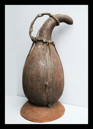 A Shapely Gourd With Encrusted Patina+ Rattan Encasing,  Bamileke Tribe Cameroon photo