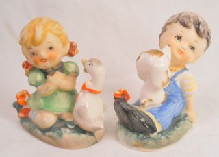 Vintage Pair Of Porcelain Boy And Girl Figurines With Dog And Duck - Cute photo