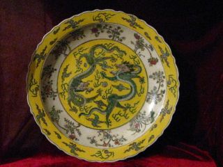 The Qing Dynasty Outstanding Powder Enamel Yellow Glaze Dragon Plate photo