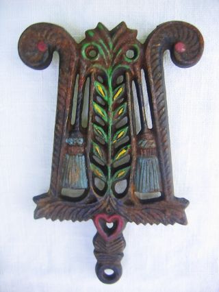 Antique Wilton Painted Cast Iron Trivet “brooms” / Tassel & Grain photo