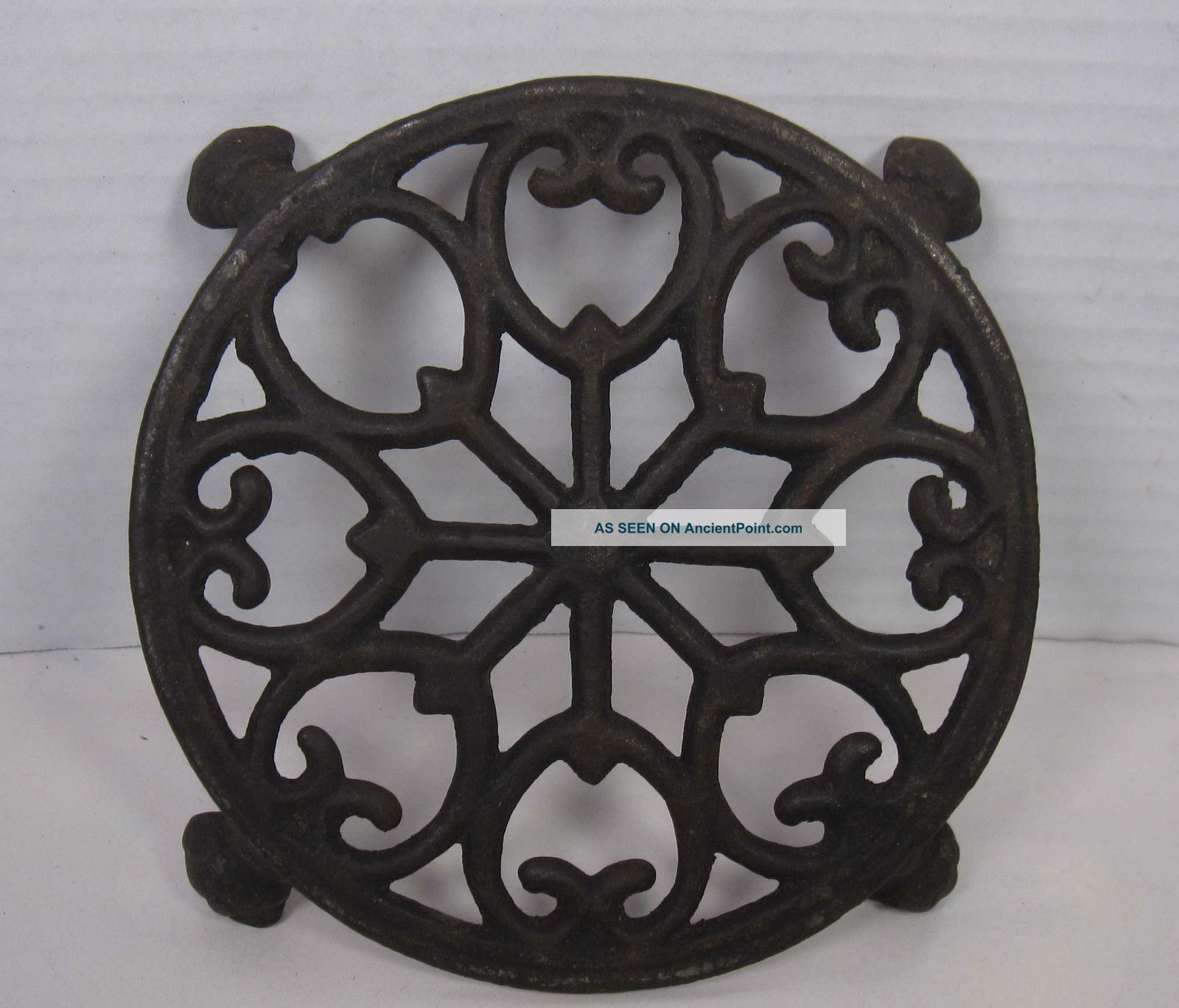 Vintage Round Cast Iron Trivet With Claw Feet Trivets photo