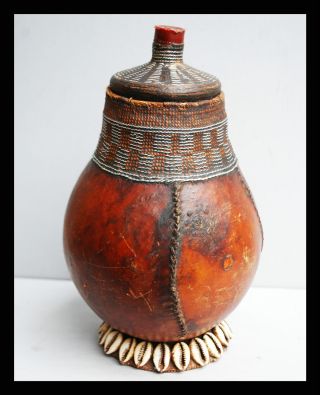 A Gourd Water Vessel W Exceptional Wire Work+cowrie Shell Decoration,  Ethiopia photo