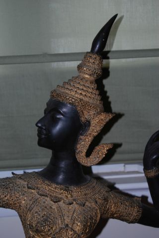 Antique Asian Diety Statue With Bow In Amazing Detail photo