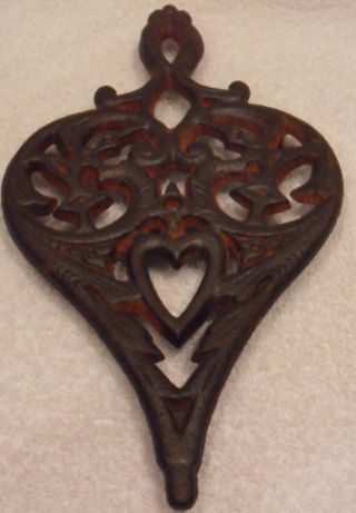 Vintage Wilton Cast Iron Trivet In Heart Shape With Heart In Bottom Center photo