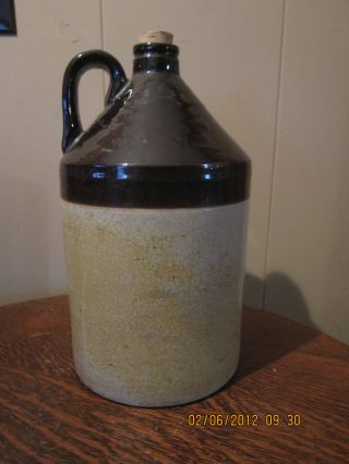Antique Two Toned Stoneware Whiskey Jug With Thumb Handle photo
