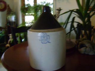 Old Jug With Four Leaf Clover Stamp photo