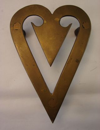 Antique Brass Heart Shaped Trivet photo