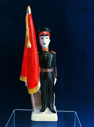 Soviet Russian Porcelain Figurine Soldier With A Flag photo