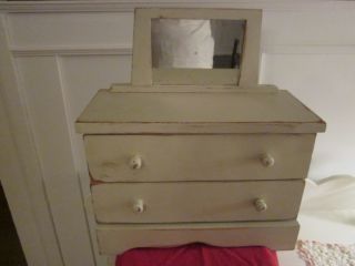 Old Doll Dresser With Two Drawers And Mirror.  Color Is Beige. photo