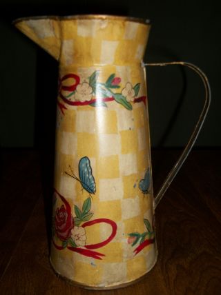 Tall Antique Style Metal Pitcher photo