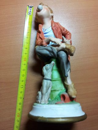 Figurine Of A Boy With A Dog,  Capodimonte Style.  Made In Spain photo