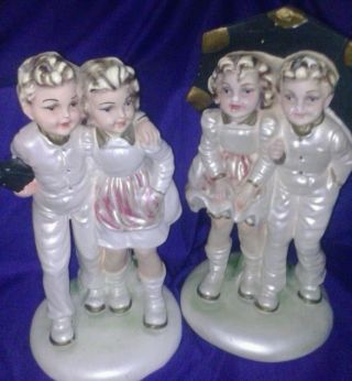 Unusual,  Old,  Awesome Pair Of Figurines,  Chalkware? Boy And Girl With Umbrella. photo