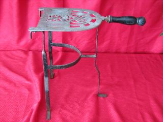 Vintage Wrought Iron Trivet Stand With Wood Handle & Brass Plate photo