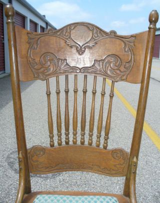 Antique Pressed Back Oak Rocking Chair photo