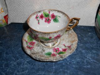 Vintage Tea Cup & Saucer: Flower Pattern photo