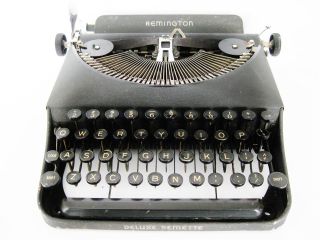 Antique 1940s Remington Deluxe Remette Typewriter Art Deco White On Black Keys photo